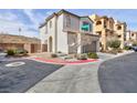 Charming two-story home with a two-car garage and well-maintained landscaping at 9881 Juno Hills St, Las Vegas, NV 89178