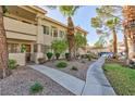 Well-maintained apartment featuring desert landscaping, covered parking and private walkways at 1201 Sulphur Springs Ln # 101, Las Vegas, NV 89128