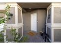 Charming entryway featuring a 'Welcome friends & Gathering' doormat at 357 Stone Fly Rd, North Las Vegas, NV 89032