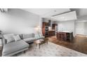 Spacious living room with an open floor plan, modern furnishings, and hardwood flooring at 4471 Dean Martin Dr # 2705, Las Vegas, NV 89103
