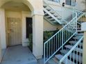 Entrance featuring secure, decorative gate with stairway at 4855 S Torrey Pines Dr # 102, Las Vegas, NV 89103