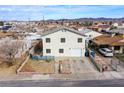 Aerial view of a home displaying landscaping, a driveway, and a residential street at 1912 Margarita Ave, Henderson, NV 89011