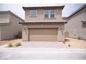 Detached two-car garage with a paved driveway, offering ample parking space at 3757 Via Gennaro, Henderson, NV 89044