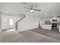 Bright living space featuring contemporary finishes and an open layout to the kitchen at 4211 Gold Desert St, North Las Vegas, NV 89032