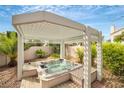 Relaxing outdoor space featuring a covered hot tub, perfect for unwinding at 2638 Douglas Cir, Henderson, NV 89074