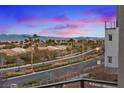 Wide street view highlighting the neighborhood's layout, landscaping, and mountain backdrop at 4288 Veraz St, Las Vegas, NV 89135