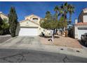 Well-maintained two-story home featuring a spacious two-car garage and manicured front yard, offering curb appeal and convenience at 6632 Ives Ave, Las Vegas, NV 89108