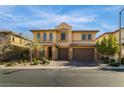 Daylight view of a two-story house, showing the home's architectural features, landscaping, and three-car garage at 12279 Lost Treasure Ave, Las Vegas, NV 89138