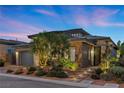 Stunning single-story home with unique brickwork, mature trees, and lush landscape at 12374 Skyracer Dr, Las Vegas, NV 89138