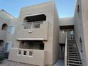 Exterior view of the condominium building with stairs leading to units and balconies at 1908 Tierra Vista Dr # 206, Las Vegas, NV 89128