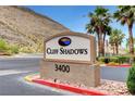 Community sign reading Cliff Shadows with palm trees and mountain backdrop at 3360 Cactus Shadow St # 102, Las Vegas, NV 89129