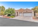 Beautiful one-story home featuring a two-car garage and mature landscaping at 8629 Estrelita Dr, Las Vegas, NV 89128