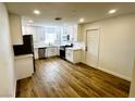 Bright kitchen with white cabinets, stainless steel appliances, and sleek countertops at , Las Vegas, NV 89121