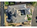 Birds eye view showcasing the home's roofline, courtyard, pool, landscaping, and overall property layout at 11296 Villa Bellagio Dr, Las Vegas, NV 89141