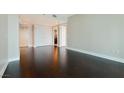 Bedroom with hardwood floors features a double door closet and bathroom entrance at 2700 Las Vegas Blvd # 1604, Las Vegas, NV 89109