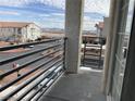 Balcony view showcasing the neighborhood and nearby buildings at 3318 N Decatur Blvd # 2057, Las Vegas, NV 89130