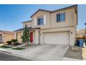 Charming two-story home with a red front door, desert landscaping, and an attached two-car garage at 5827 Delonee Skies Ave, Las Vegas, NV 89131