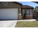 Close up of the exterior of this house, including the stone facade at 10321 Birch Bluff Ln, Las Vegas, NV 89145