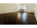 Bedroom with hardwood floors, natural light, and neutral walls at 1405 Vegas Valley Dr # 357, Las Vegas, NV 89169