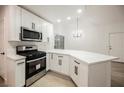 Beautiful kitchen featuring stainless appliances, quartz countertops and plenty of storage space at 2925 Wigwam Pkwy # 923, Henderson, NV 89074