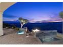 Patio featuring a fire pit and water features in an outdoor setting at 37 Avenida Fiori, Henderson, NV 89011