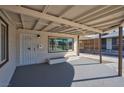 Inviting covered front porch features ample space for outdoor seating and a welcoming entrance at 457 Federal St, Henderson, NV 89015