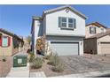 Two-story home features a two-car garage, low-maintenance landscaping, and modern design at 7256 Saxby Ave, Las Vegas, NV 89113