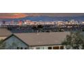 Beautiful city view of Las Vegas skyline from a residential neighborhood with mountains in the distance at 4504 Eagle Nest Peak St, Las Vegas, NV 89129