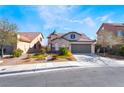 Well-maintained single-Gathering home featuring a two-car garage and neat front yard in a residential area at 792 Valley Rise Dr, Henderson, NV 89052