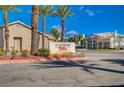 A view of the Rainbow Villas at Ventana Canyon community entrance sign at 209 Roxborough St, Henderson, NV 89074