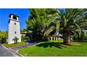 Beautiful manicured landscaping surrounds the exterior of the home at 2305 Plaza Del Grande, Las Vegas, NV 89102