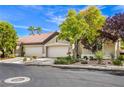 Inviting single-story home with desert landscaping and a spacious two-car garage at 5078 Shadow River St, Las Vegas, NV 89148