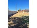 Large backyard space with potential for landscaping and outdoor activities at 535 Straight St, Las Vegas, NV 89110