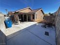 Backyard featuring a concrete patio, chain link fencing, and room to create your outdoor oasis at 5513 Oakwood Ridge St, Las Vegas, NV 89130