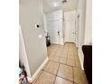 Inviting entryway featuring tile flooring, neutral paint, and direct access to the main living areas at 6819 Mahogany Meadows Ave, Las Vegas, NV 89122