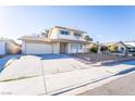 Charming two-story home featuring a spacious driveway and well-maintained front yard at 804 Vincent Way, Las Vegas, NV 89145