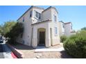Inviting home features a covered porch and well-maintained desert landscaping at 1286 Horizon Village Ave, Las Vegas, NV 89183