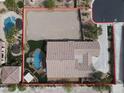 Aerial view of property with a large backyard area and a pool, highlighting the home's layout and outdoor space at 6392 Ebony Legends Ave, Las Vegas, NV 89131