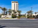 Durango Casino & Resort entrance with lush landscaping and palm tree-lined driveway at 8777 W Maule Ave # 2167, Las Vegas, NV 89148