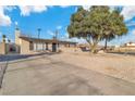 Single-story home featuring a large front yard and a long driveway leading up to the property at 4578 Ridgedale Ave, Las Vegas, NV 89121