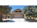 Charming two-story home with landscaped front yard and covered porch at 5413 Bristol Bend Ct, Las Vegas, NV 89135