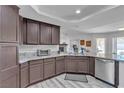 Well-equipped kitchen boasts stainless steel appliances, granite countertops, and ample cabinet space for storage and functionality at 5841 Doubletree Rd, Pahrump, NV 89061