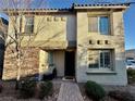 Charming home with stone accents, neat landscaping, and a welcoming front entrance at 6145 Scarlet Leaf St, Las Vegas, NV 89148