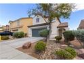 Charming two-story home with a two car garage, well maintained landscaping, and a traditional design at 8124 Loma Del Ray St, Las Vegas, NV 89131