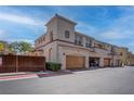 Modern townhome with attached garage and well-maintained landscaping in a desirable neighborhood at 1040 Via Panfilo Ave, Henderson, NV 89011