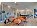 Comfortable living room with stylish decor, hardwood floors, and an open-concept design at 24 Cliffwater St, Henderson, NV 89011