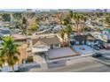 Aerial view of the property showcasing it's proximity to downtown, the pool, and the neighborhood at 5399 Surrey St, Las Vegas, NV 89119