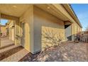 Exterior view with a well-kept front entrance and a lovely brick walkway at 8144 Skye Dragon St, Las Vegas, NV 89166