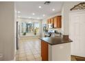 Bright eat-in kitchen with stainless steel appliances and a large window at 9489 Liquid Loco St, Las Vegas, NV 89178