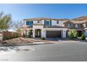 Inviting two-story home with a manicured front yard at 9519 Chandler Springs Ave, Las Vegas, NV 89148